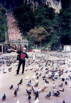 KYLE AND PIGEONS AT THE FOOT OF THE BATU STEPS